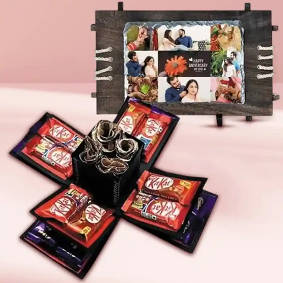 Delightful personalized gift hamper for her with chocolates, a photo rock, and golden roses.