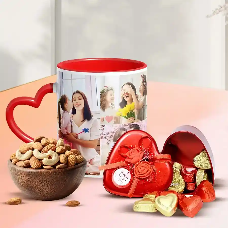 Personalized photo mug with heart handle, heart-shaped chocolates in a stylish tin, and a bowl of dry fruits arranged for a gift presentation.