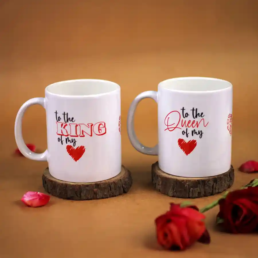 Elegant ceramic mugs in a gift box, perfect for toasting together.