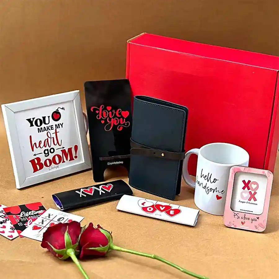Romantic Valentine's Day Gift Hamper with a leather passport cover, mobile stand, photo frame magnet, ceramic mug, wall hanging frame, chocolates, and Valentine cards.