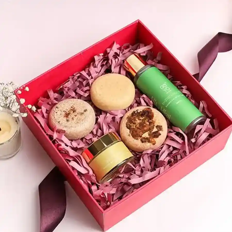 Golden Glow Beauty Ensemble with goat milk soaps and skincare products.