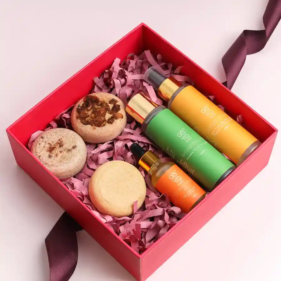 Luminous Beauty Essentials Collection featuring goat milk soaps, hair oil, and face toner for radiant skin and hair.
