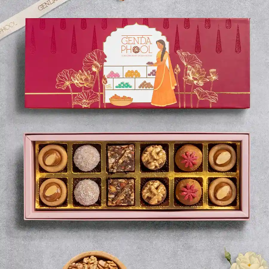 Sugar-Free Blissful Mithai Box with assorted sugar-free sweets, including Fig-n-Date, Tropical Delight, Jaggery Besan Laddu, Golden Almonds, and Apple Spice.