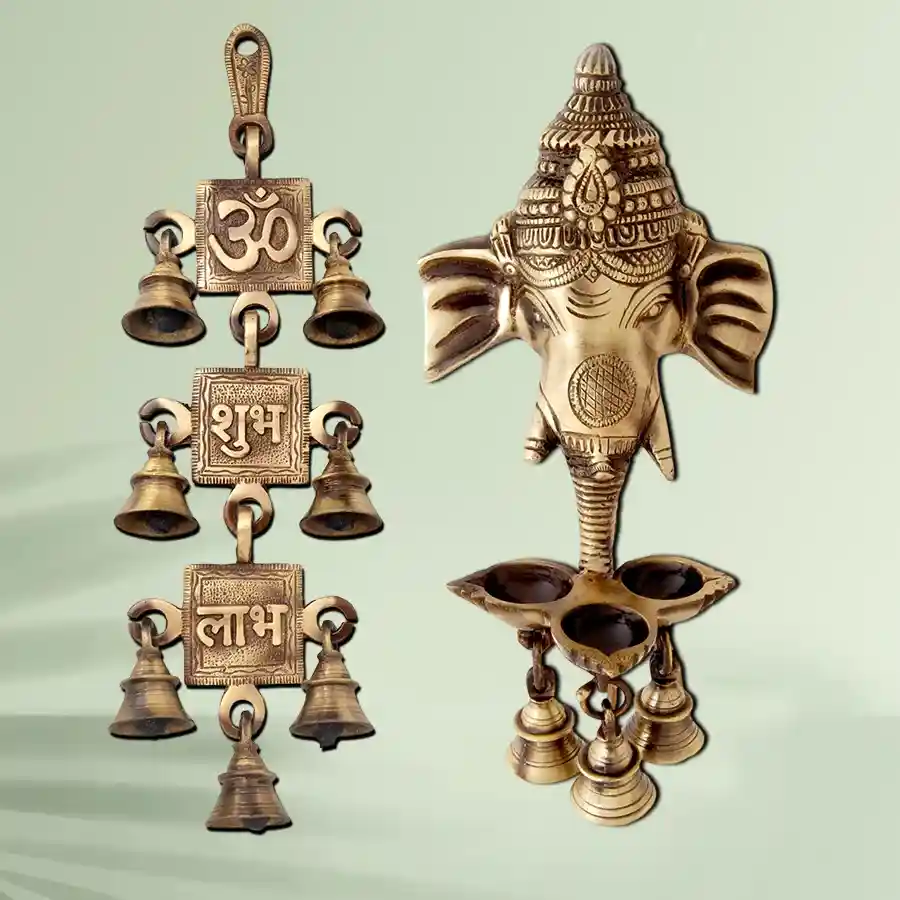 Ganesha Wall Hanging Deepak in brass with hanging bells, featuring a warm brown color, perfect for adding a spiritual touch to home decor.