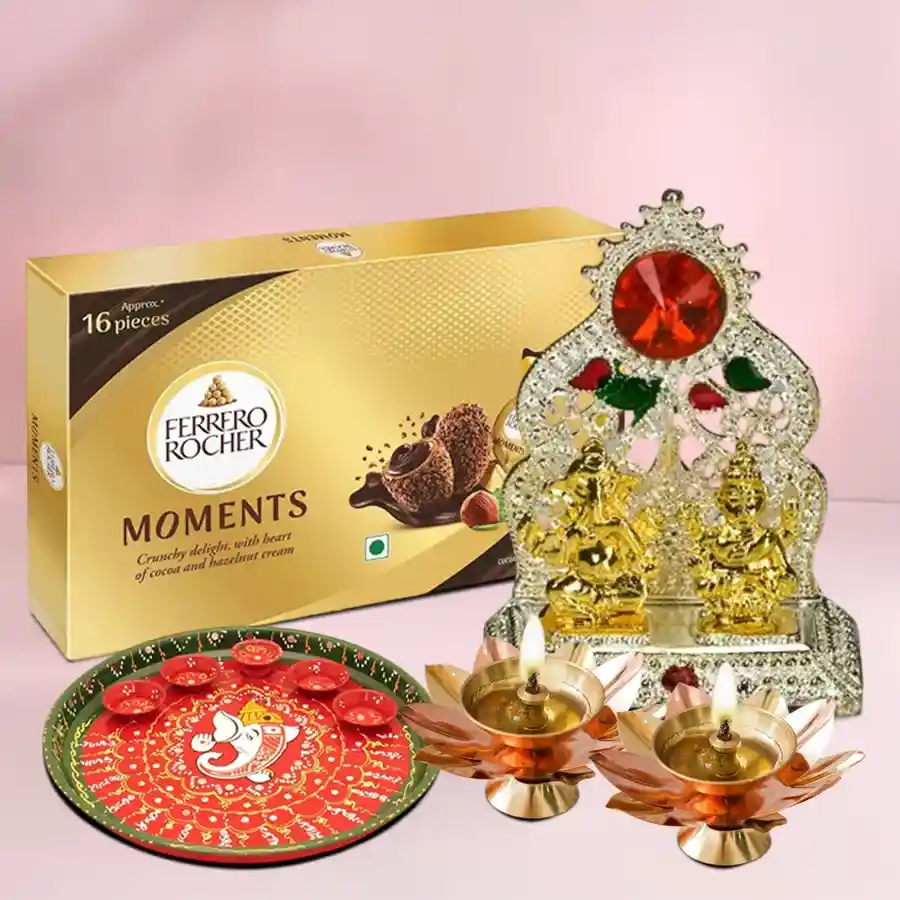 Heartfelt Puja Celebration Gift Set featuring a hand-painted thali, brass diyas, Ganesh Laxmi idol, and Ferrero Rocher chocolates.