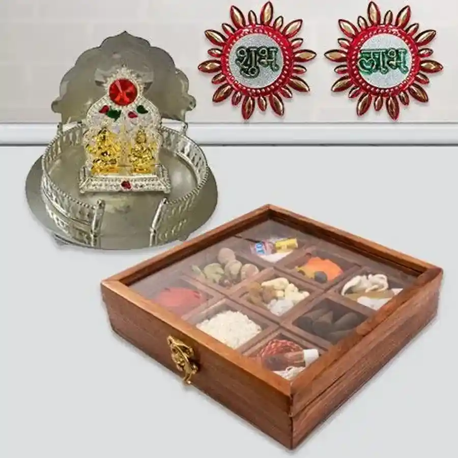 Celestial Blessings Pooja Package featuring a Silver Plated Mandir Case, Ganesh Laxmi Mandap, and assorted Pooja Samagri.