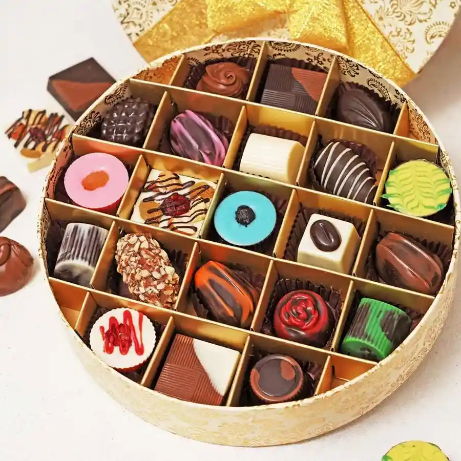 Decadent Chocolate Assortment Box featuring a variety of chocolates including dark, milk, fruity, and nutty flavors in an elegant packaging.
