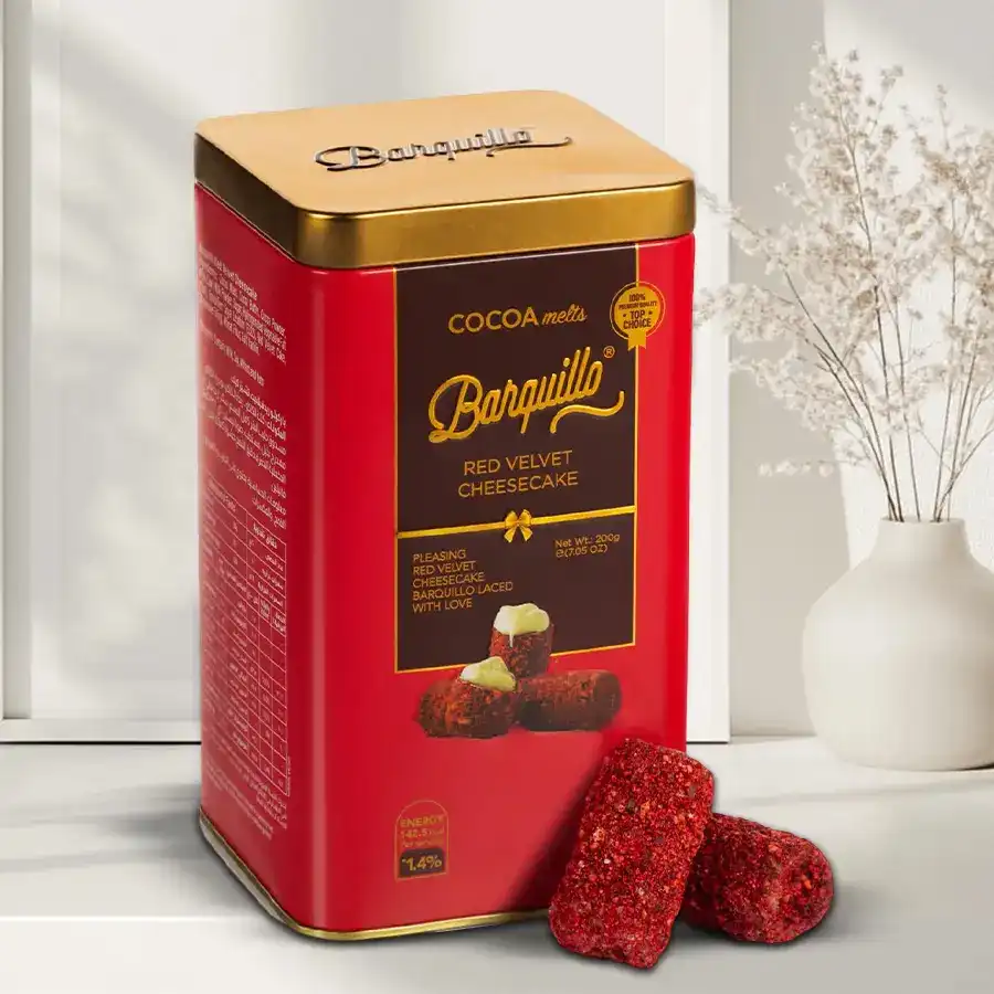 Barquillo Red Velvet Cheesecake Chocolate Tin featuring layers of red velvet cake and cheesecake wrapped in chocolate