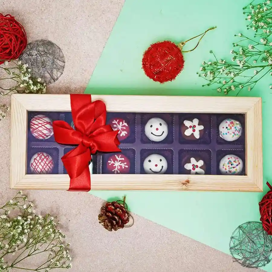 Assorted box of Holiday Indulgence Chocolate Truffles featuring flavors like Cranberry, Dark Chocolate, White Chocolate, Oreo, Milk Chocolate, and Coconut