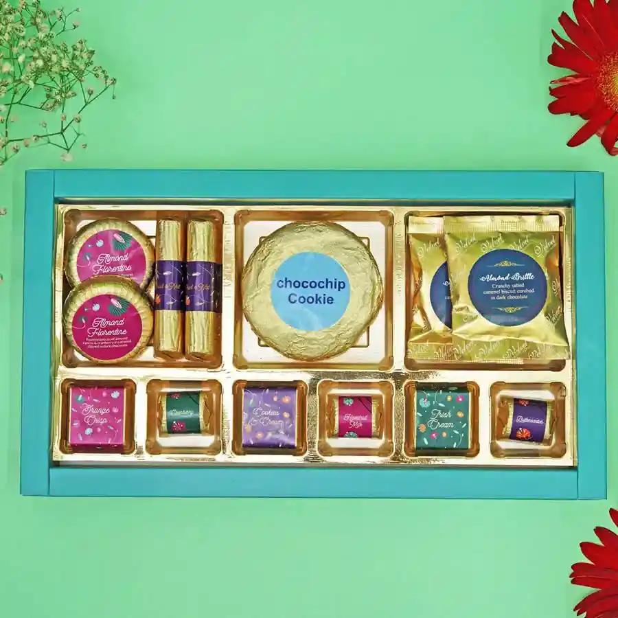 Delightful Chocolate and Cookie Box featuring Almond Florentines, Chocochips Cookie, Almond Brittles, assorted chocolates, and Fruit and Nut Chocolate Logs