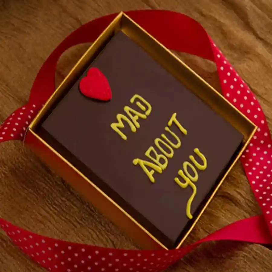 Ultimate Chocolate Love Bar in an elegant gift box with a personalized message tag.