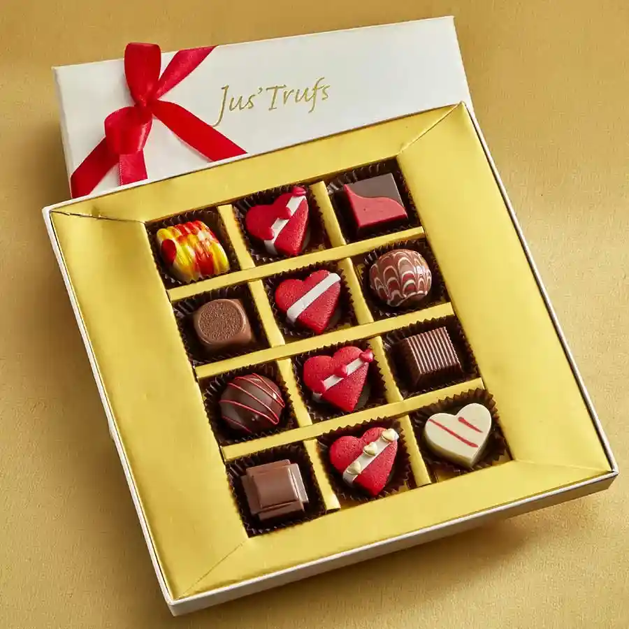An elegant Mandala box filled with 8 assorted truffles and 4 heart-shaped marzipan truffles, beautifully arranged and ready for gifting.