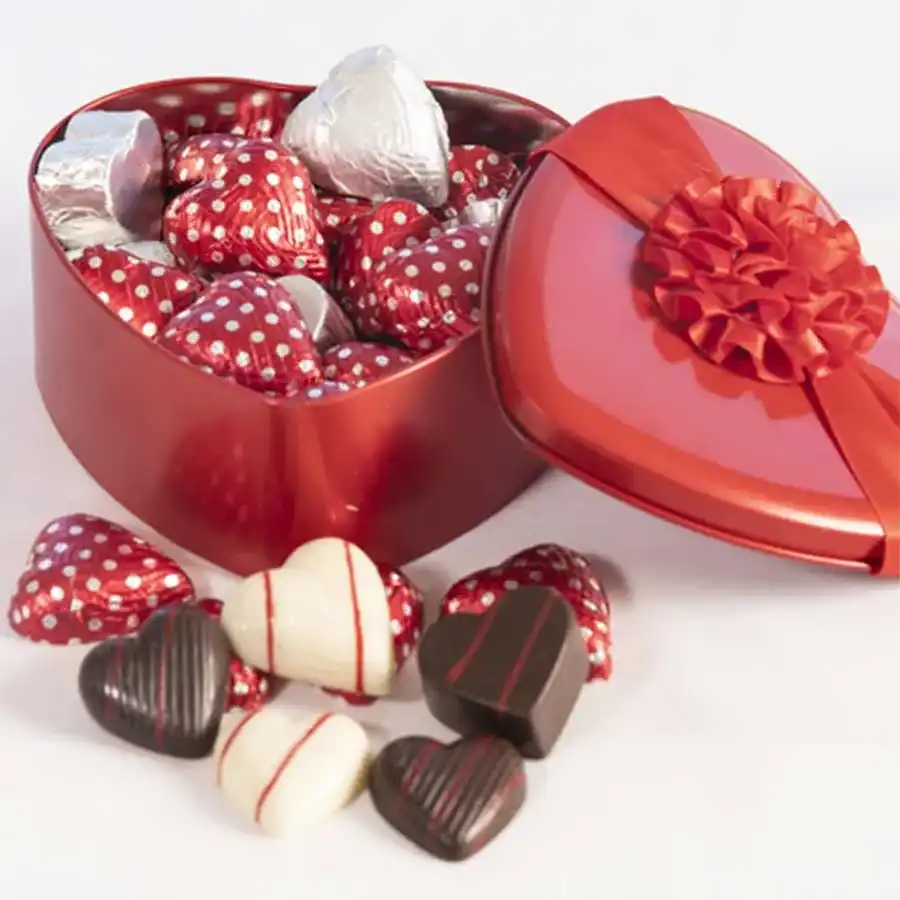 Heart-shaped tin filled with 15 assorted chocolates in various flavors