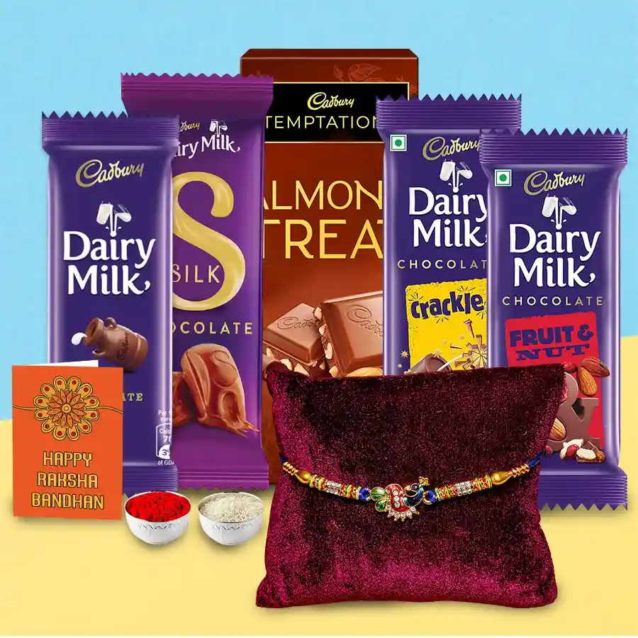 Delicious Cadbury chocolate assortment with Rakhi, Roli Tilak, and Chawal for Raksha Bandhan celebration