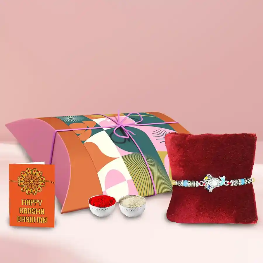 Assorted homemade flavoured dates chocolates in a pink pillow for Rakhi celebration