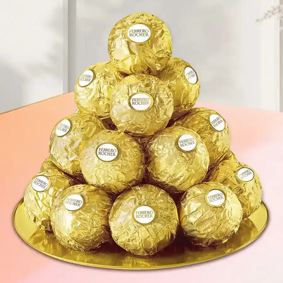 Golden platter filled with 16 Ferrero Rocher chocolates, elegantly arranged and ready for gifting.