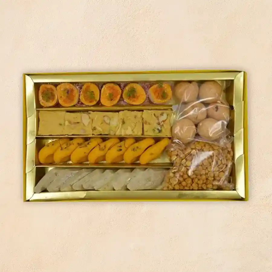 Premium Mithai Gift Box filled with Kaju Katli, Soan Papdi, Kesaria Peda, Mawa Gilory, Mini Kachori, and Chana Dal for sweet celebrations.