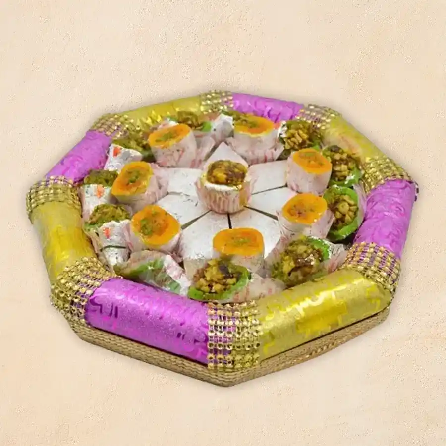 Urban Treats Sweet Indulgence Platter featuring assorted Indian sweets.