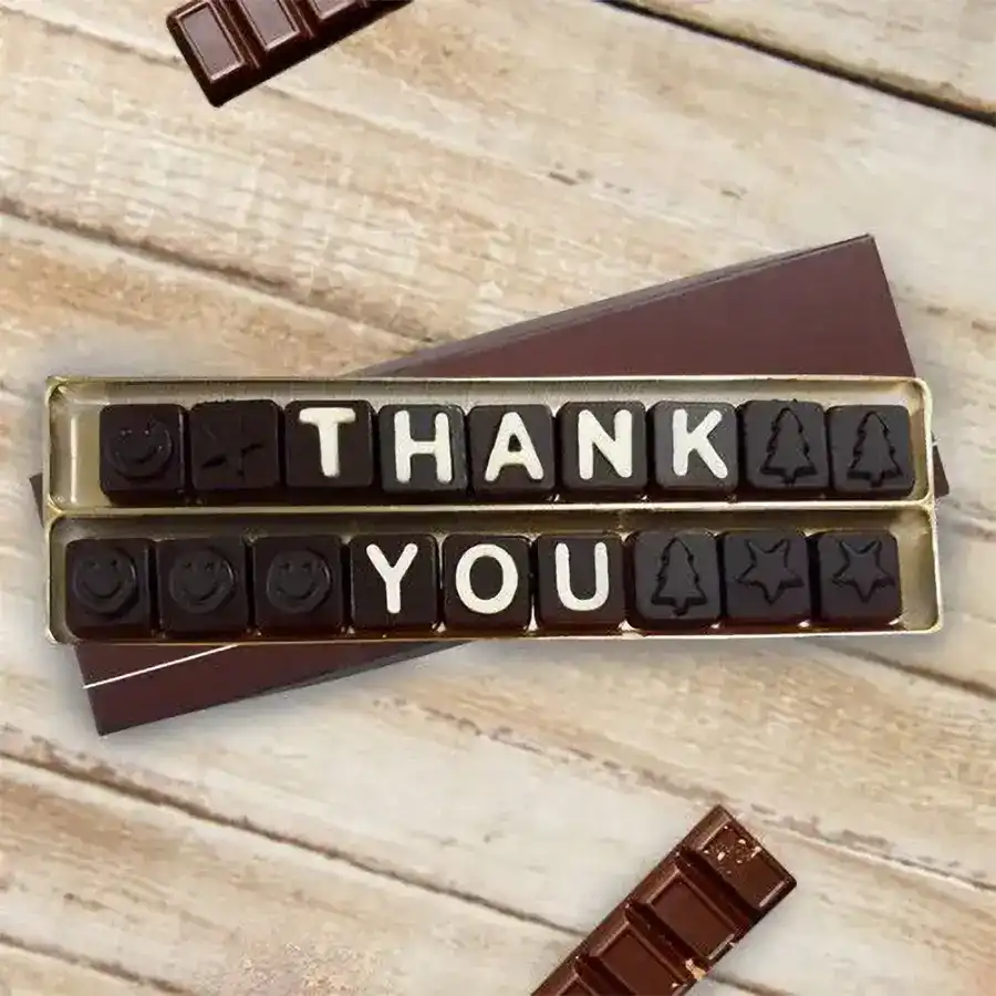 Homemade chocolates pack with a thank you message and a decorative design