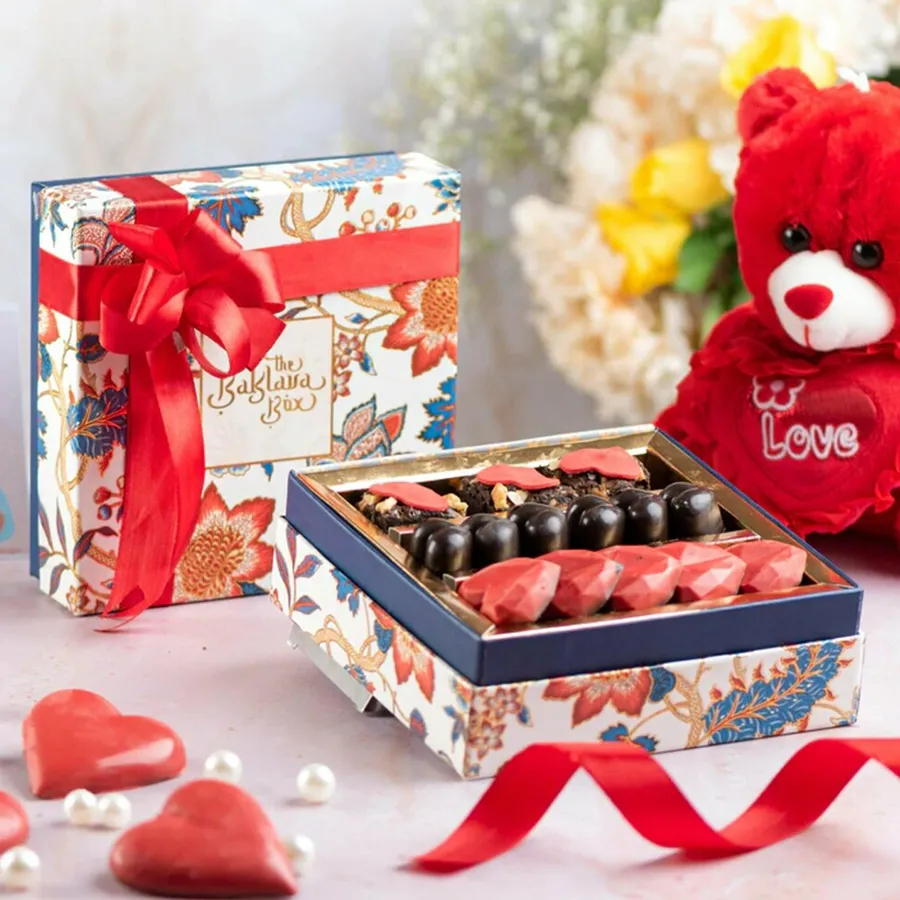 Sweetheart’s Chocolate & Brownie Delight gift box with chocolates and a brownie, elegantly wrapped in ribbon.