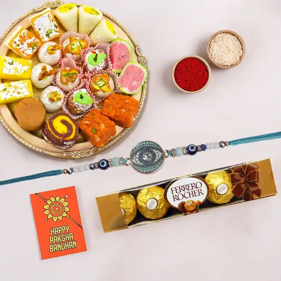 Haldiram Assorted Sweets paired with Ferrero Rocher chocolates and a free Rakhi, perfect for gifting and celebrations.