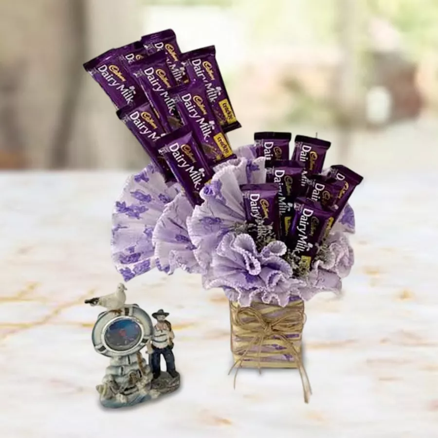 Yummy Chocolate Arrangement featuring 15 Cadbury Dairy Milk Crackle pieces beautifully packaged and tied with tissue
