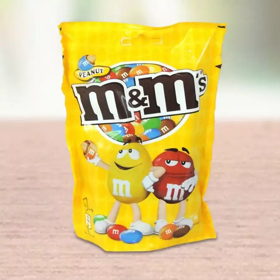 Colorful M&M's Peanut Coated Chocolates in a decorative bowl
