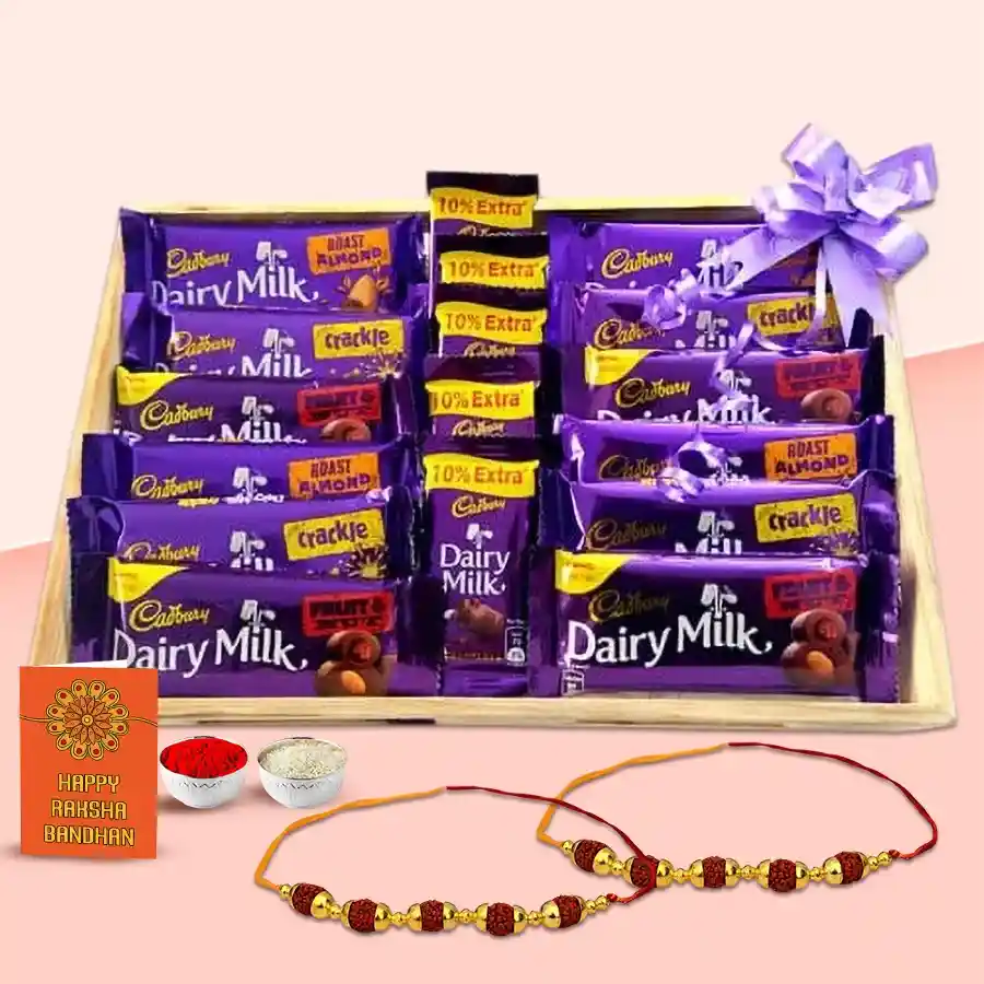 Classic Cadbury Chocolates Assortment in a wooden tray tied with a ribbon, featuring various chocolate bars and pieces
