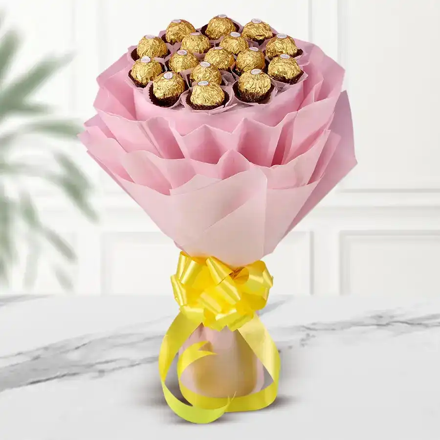 Ferrero Rocher Chocolate Bouquet featuring 16 chocolates elegantly arranged in tissue wrapping.