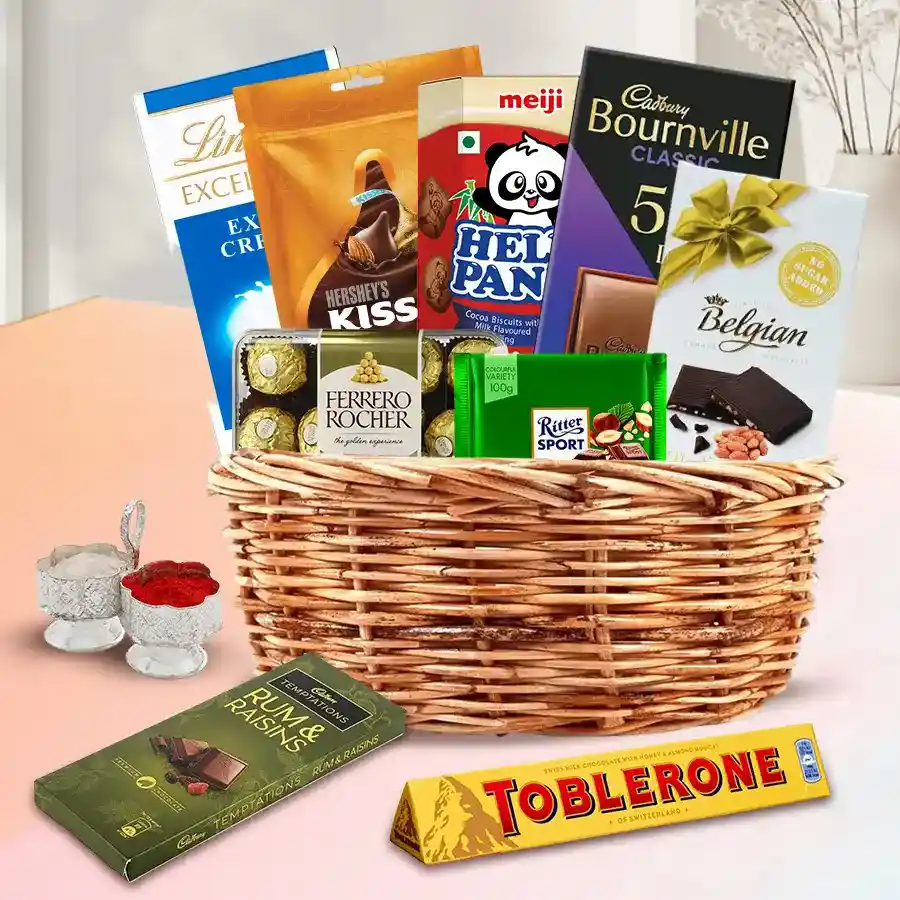 Amusing Goodies Gift Hamper for Bhai Dooj featuring chocolates, biscuits, and traditional essentials in a decorative basket