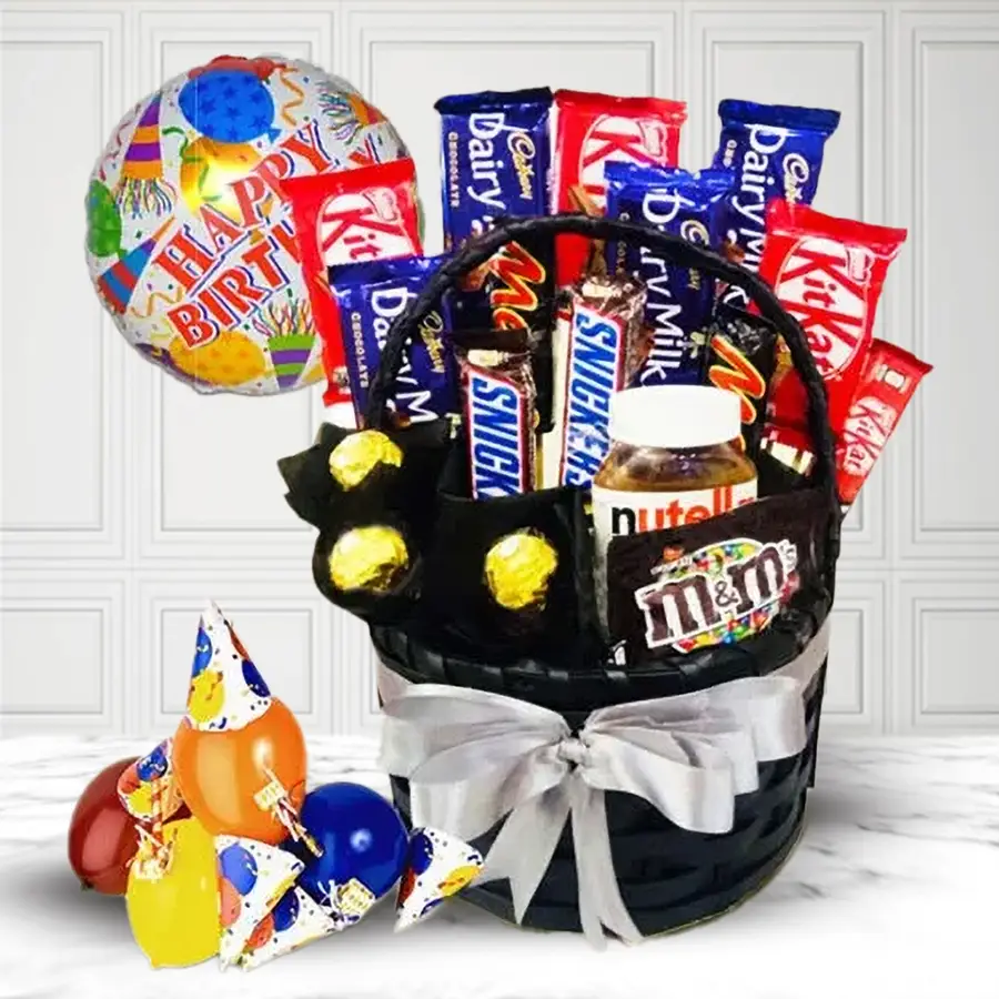Marvellous Chocolate Gift Basket filled with Ferrero Rocher, Cadbury Dairy Milk Fruit & Nut, Kit Kat, Snickers, Mars bars, Nutella, M&M’s, and a Happy Birthday balloon