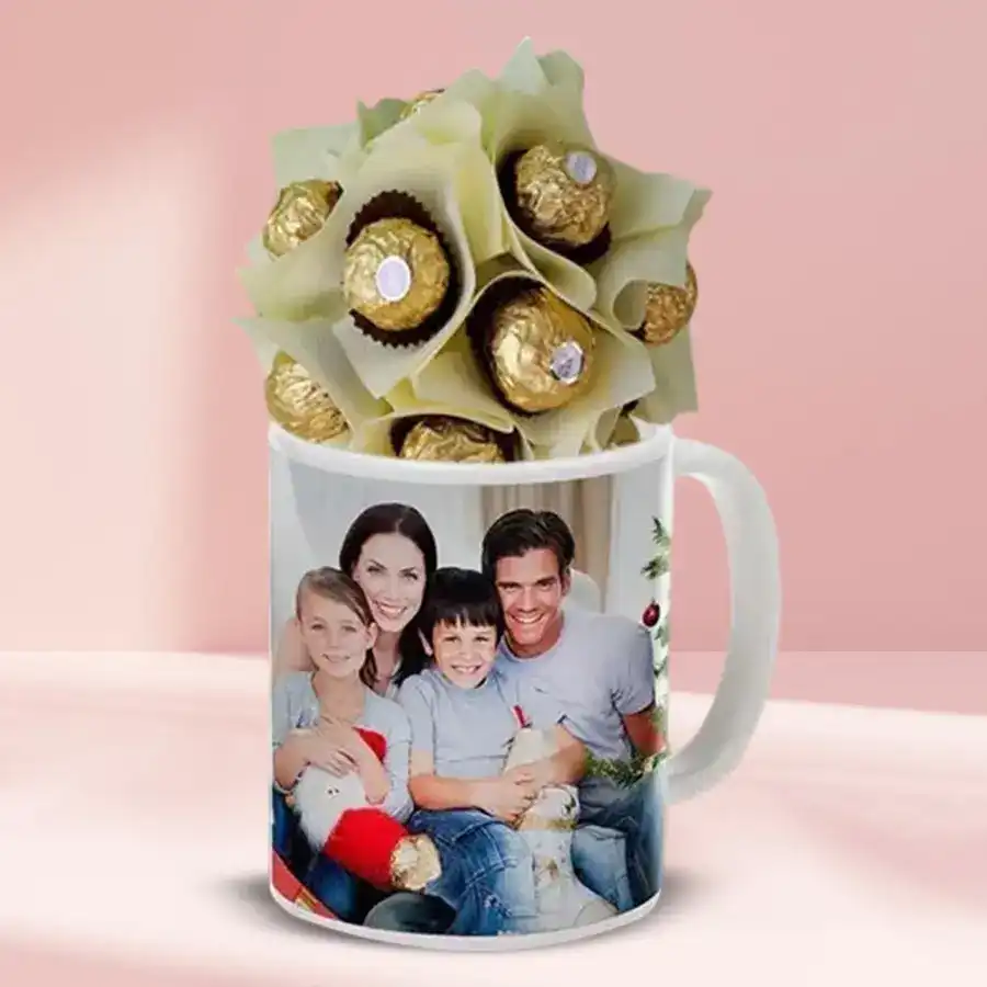 Exquisite personalized coffee mug with custom engraving and 8 Ferrero Rocher chocolates arranged beside it