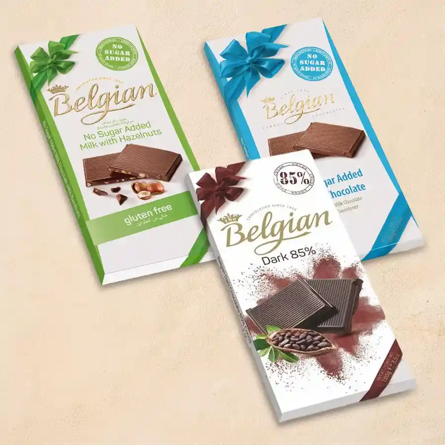 Assorted Belgian chocolates including milk chocolates, dark chocolate bars, and hazelnut crunch pieces in an elegant gift pack.