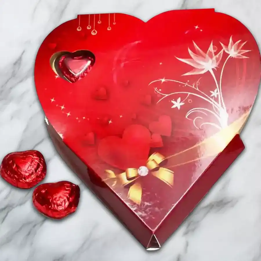 Heart-shaped box filled with handmade chocolates, symbolizing love and affection.