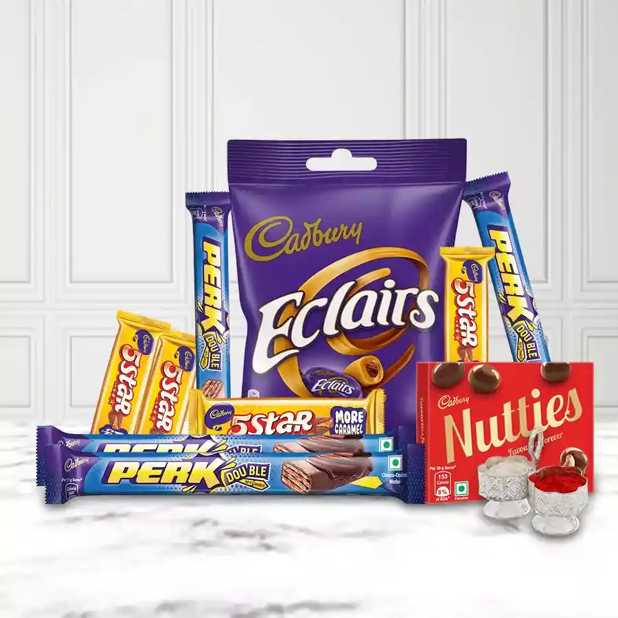Scintillating Gifts Package featuring Cadbury chocolates, Tika, and Chawal for Bhai Dooj celebration