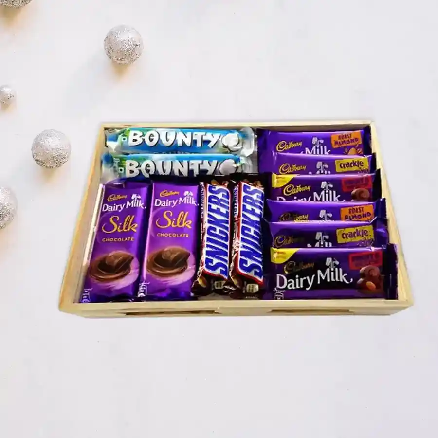 Sweet Birthday Chocolate Voyage hamper with assorted Cadbury and Snickers chocolates in a wooden gift tray.