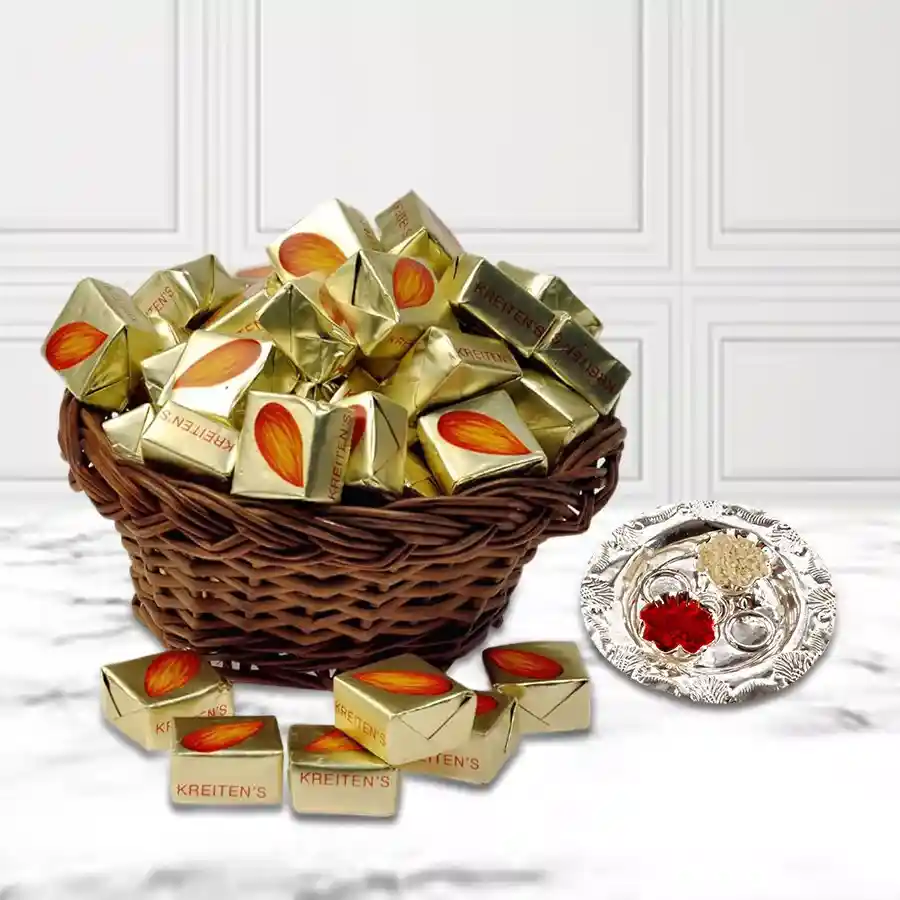 Almond toffee basket with silver-plated paan-shaped Puja Thali and complimentary Bhai Dooj Tika and Chawal
