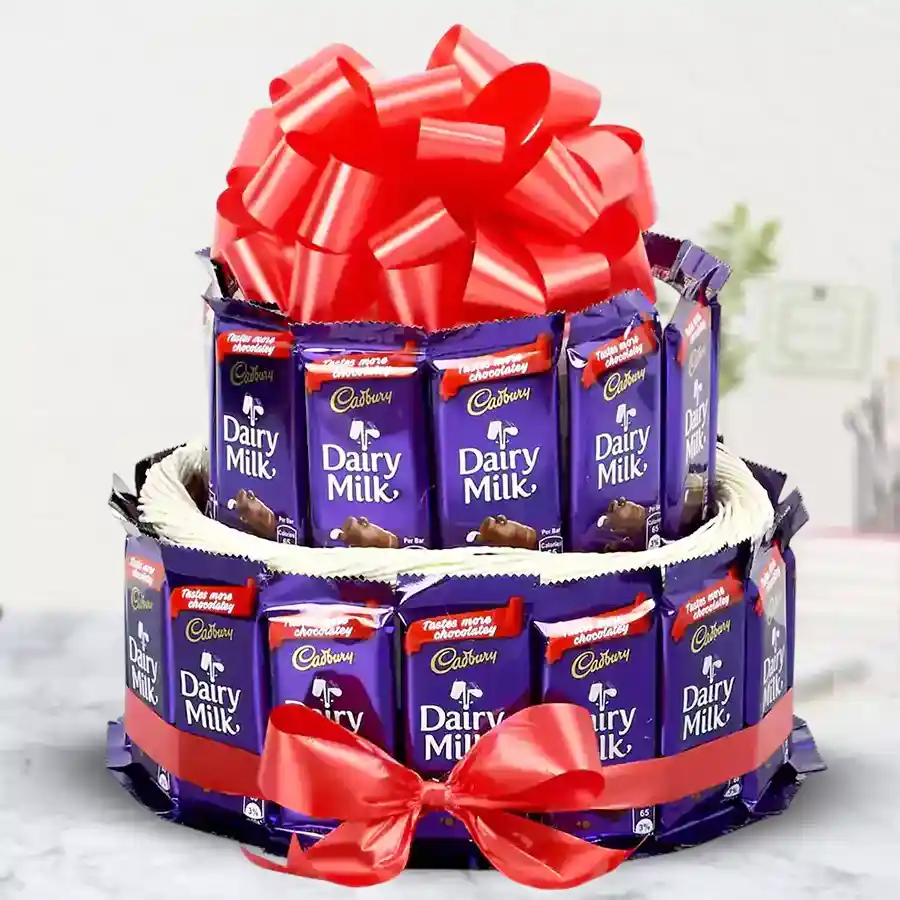 Two-tier arrangement filled with 30 Cadbury Dairy Milk chocolates, each 13 grams, designed for sharing joy and delightful moments.
