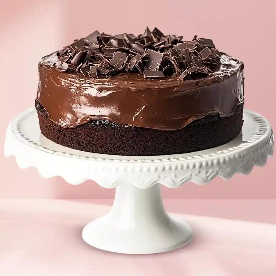 Freshly baked 1 lb chocolate cake from Cakes N Bakes or McRennett Cakes, available for delivery in Chennai.