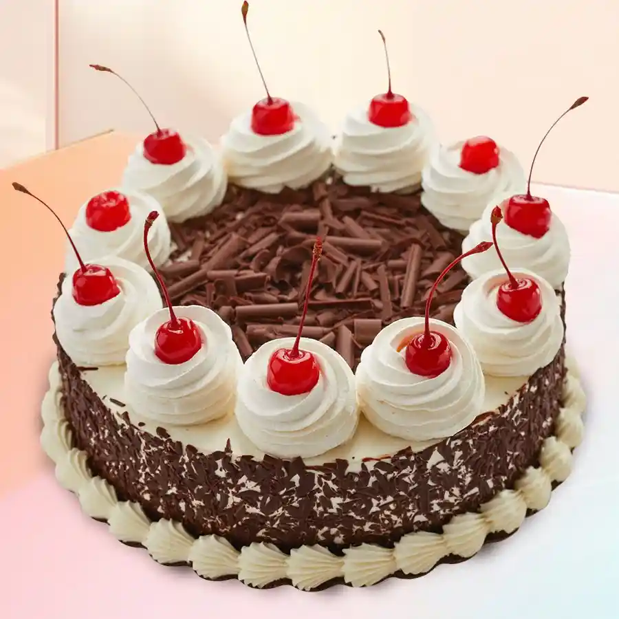 500-gram Velvety Black Forest Cake from Cakes n Bakes, featuring chocolate layers, whipped cream, and cherries.