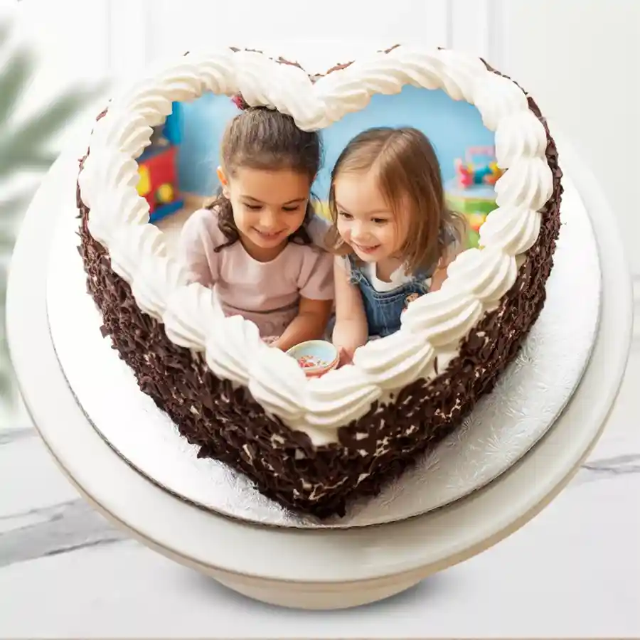 Heart Shape Black Forest Photo Cake with cherries and creamy frosting, personalized with a photo, perfect for celebrating special moments.