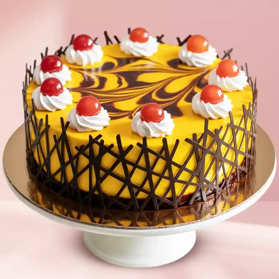 Pineapple Dream Chocolate Delight Cake with creamy frosting and fresh fruit topping.