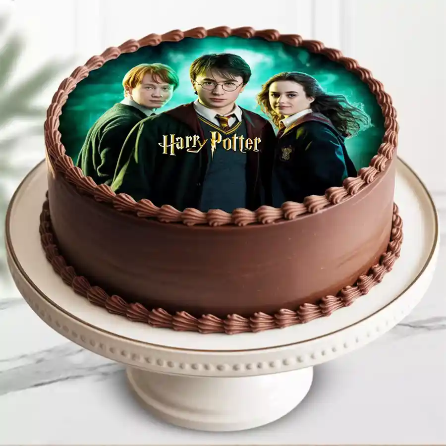 Magical Harry Potter Chocolate Cake featuring a chocolate sponge base and frosting, adorned with a Harry Potter poster. Perfect for young fans!