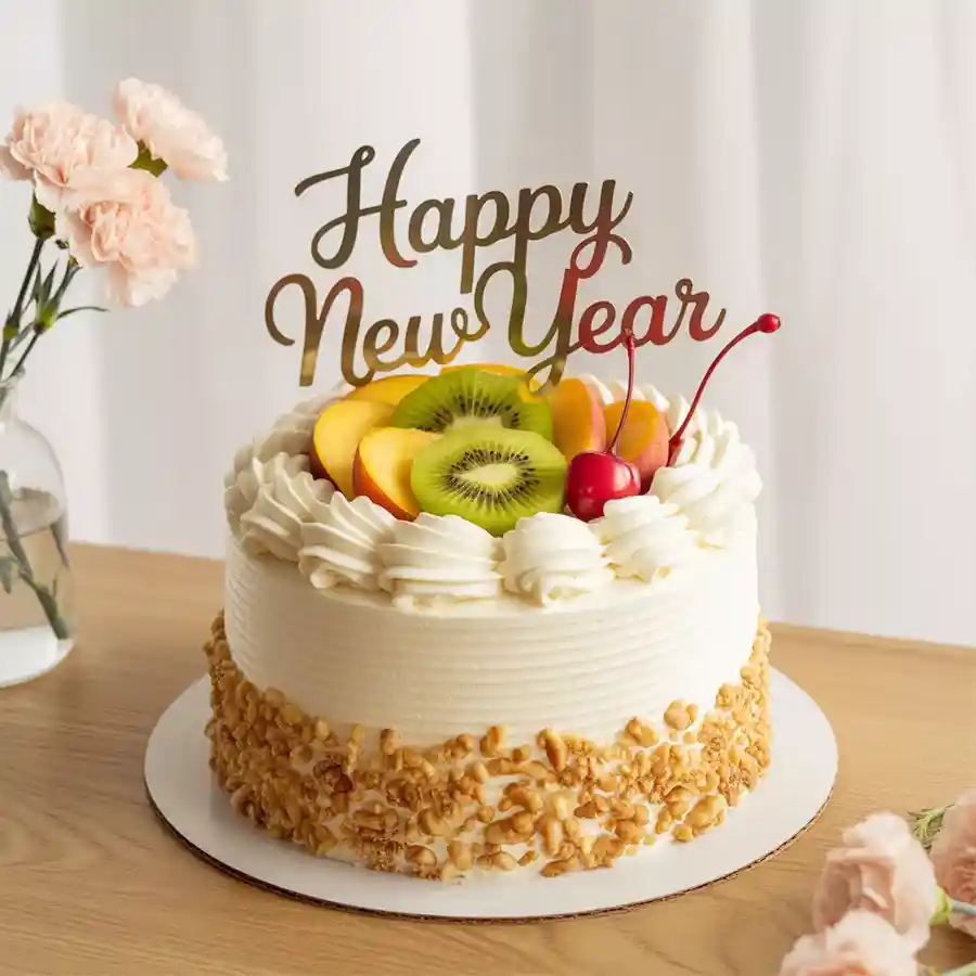 1 Kg Fresh Fruit Cake adorned with vibrant fruits for joyful occasions.