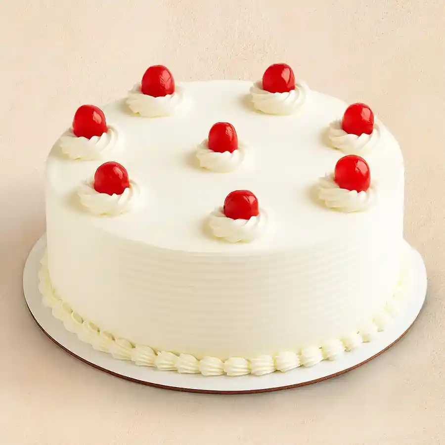 1/2 kg Vanilla Cake, perfect for gifting and creating memorable moments.