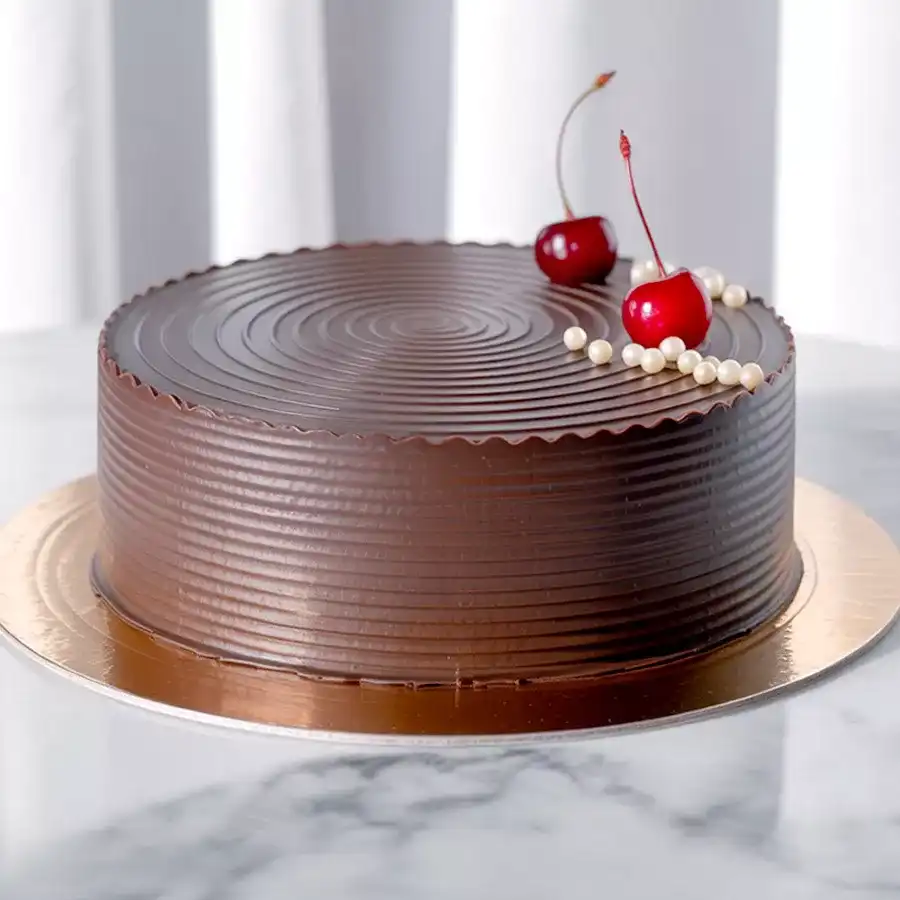 A 1/2 kg Chocolate Truffle Cake, perfect for Mother's Day or special celebrations, designed to bring joy and sweetness.