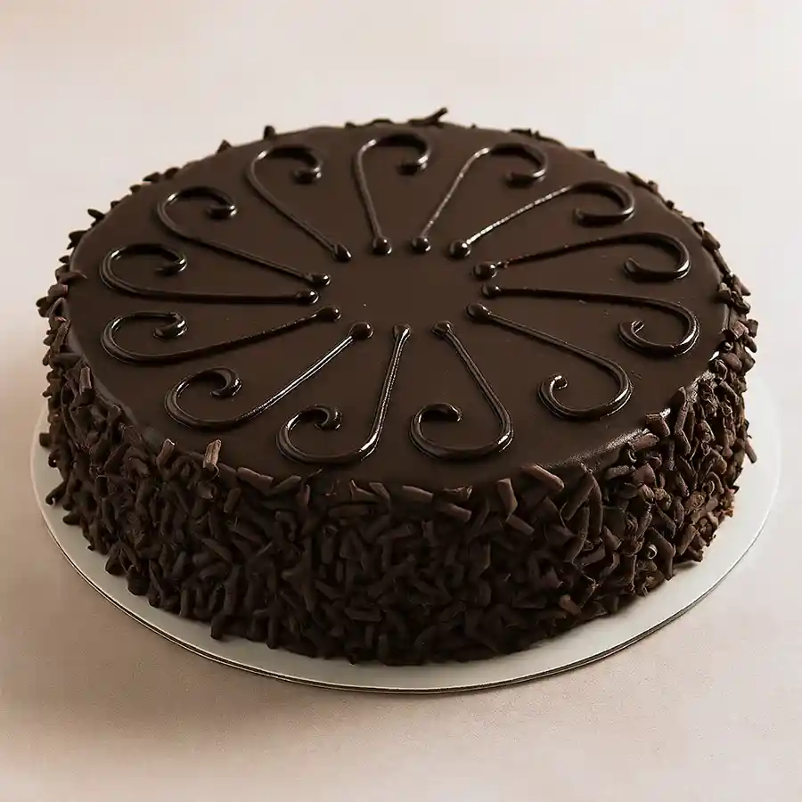 An inviting 1 lb eggless chocolate birthday cake, perfect for celebrations.