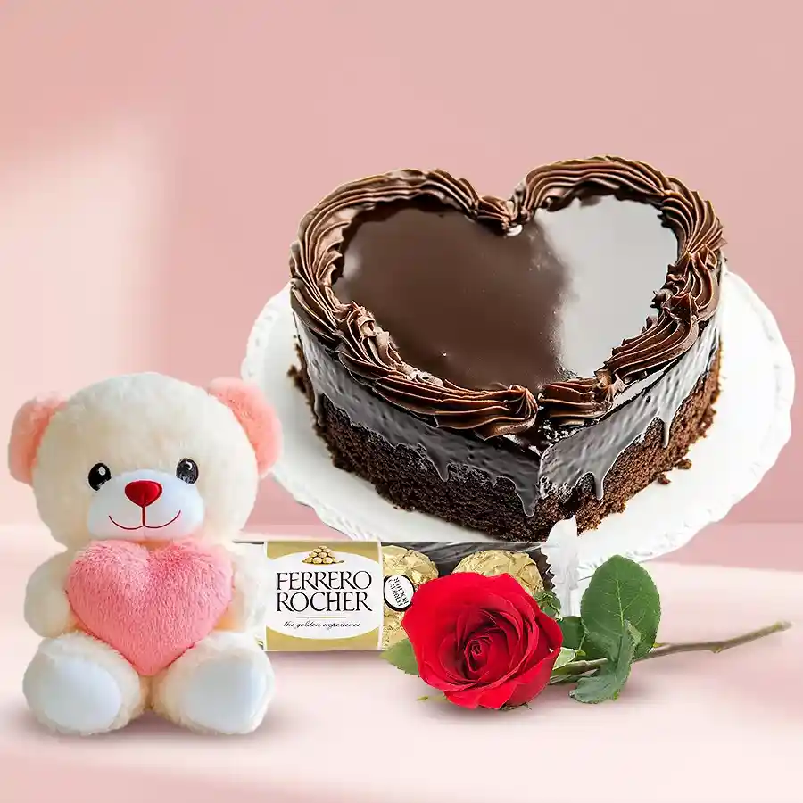 Chocolate Heart Cake with a rose, teddy bear, and Ferrero Rocher chocolates.