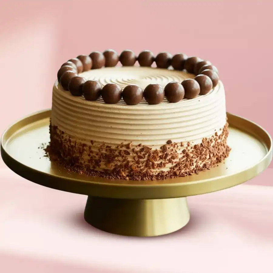 An eggless coffee cake, freshly baked, perfect for gifting to Mummy.