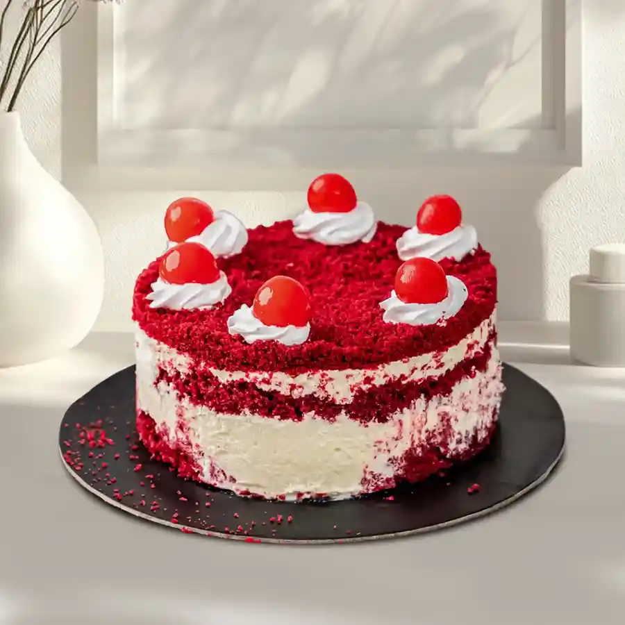 A 1 lb Red Velvet Cake, beautifully decorated, perfect for celebrations and gifting to loved ones.